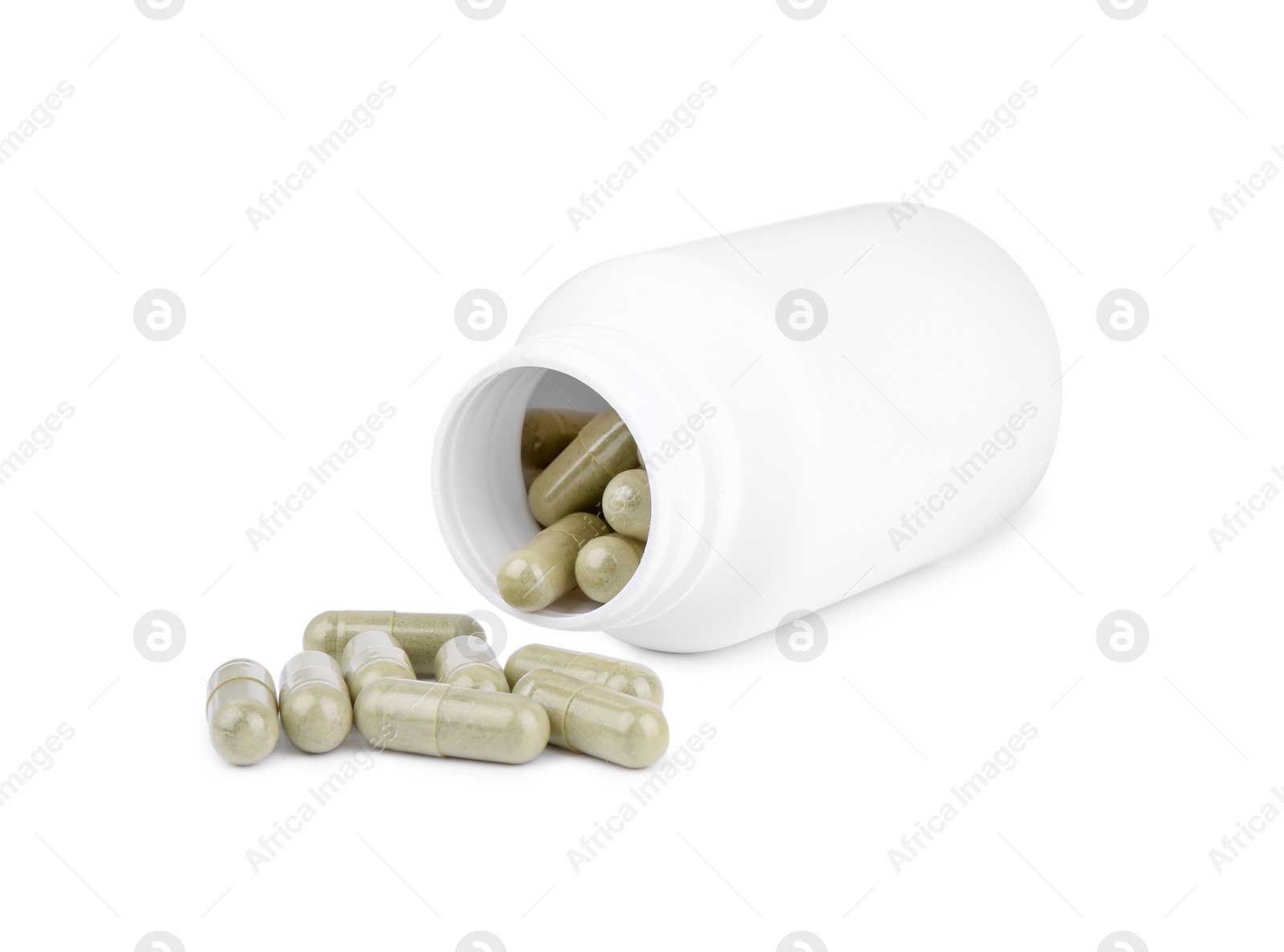 Photo of Vitamin capsules and medical bottle isolated on white