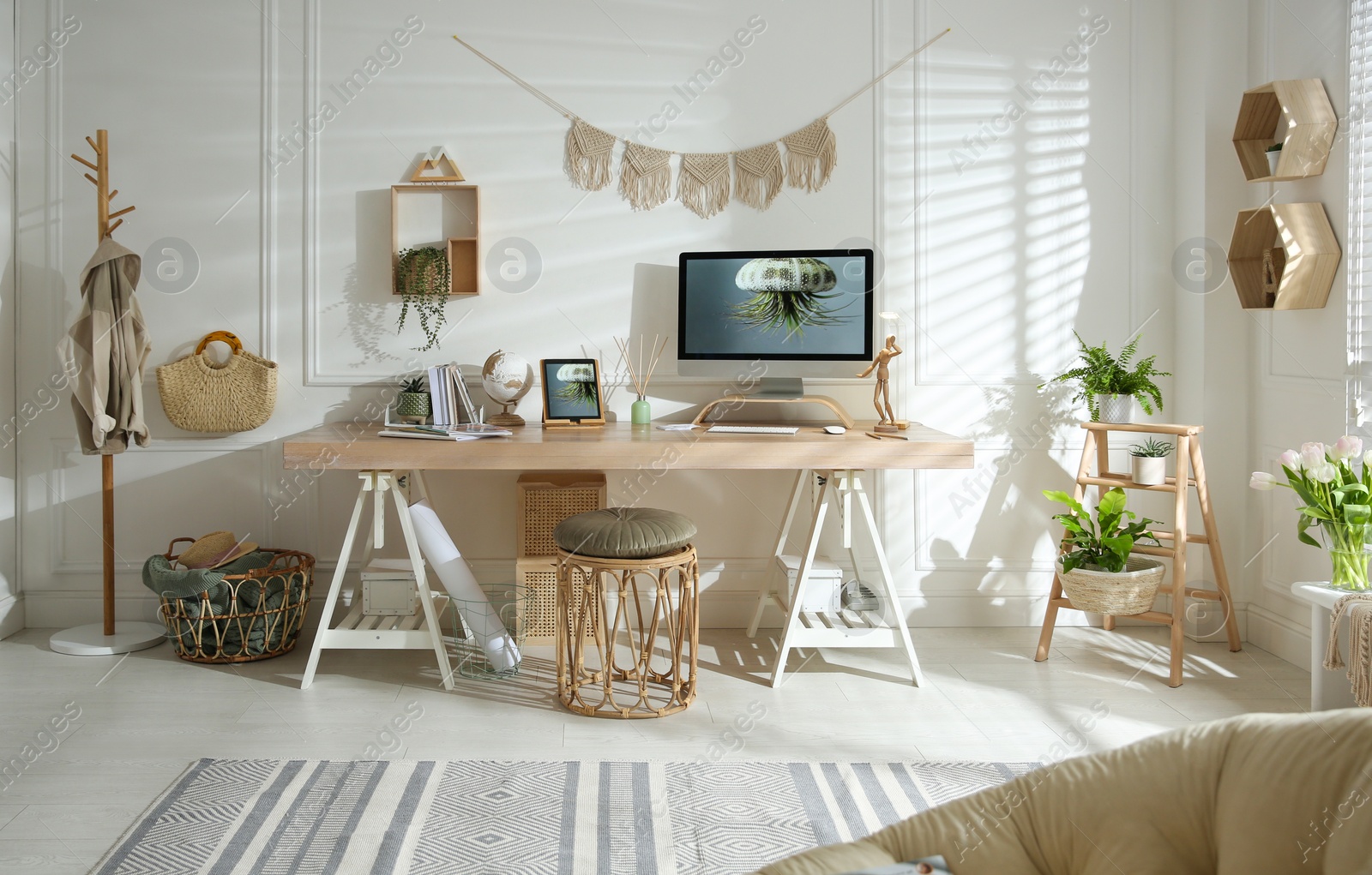 Photo of Stylish home office interior with comfortable workplace