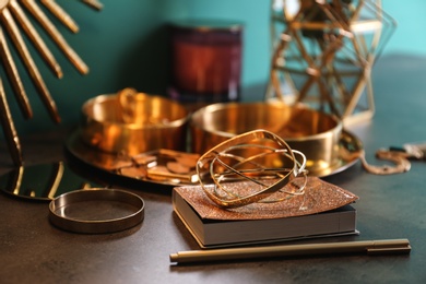 Composition with stylish accessories and interior elements on grey table