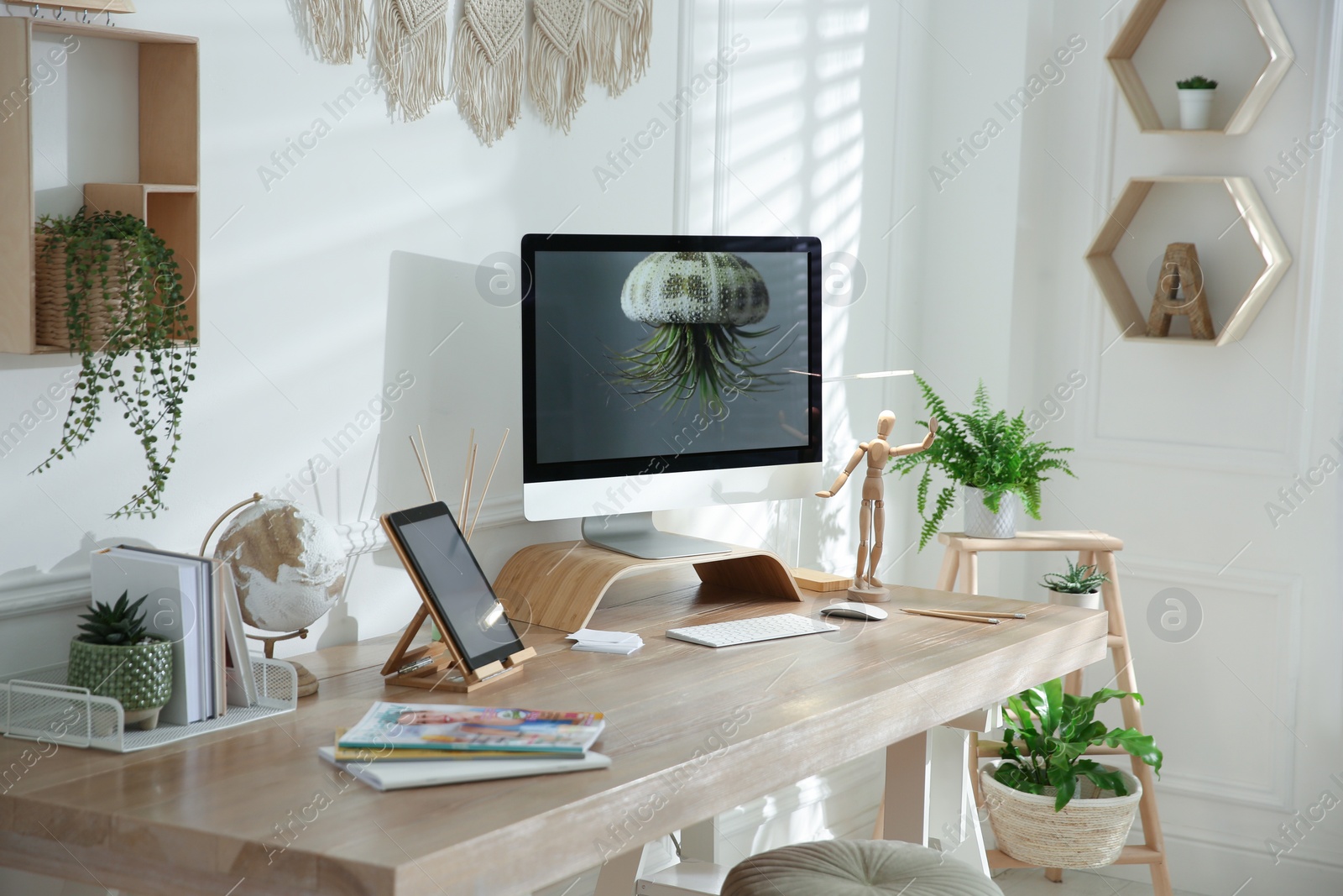 Photo of Stylish home office interior with comfortable workplace