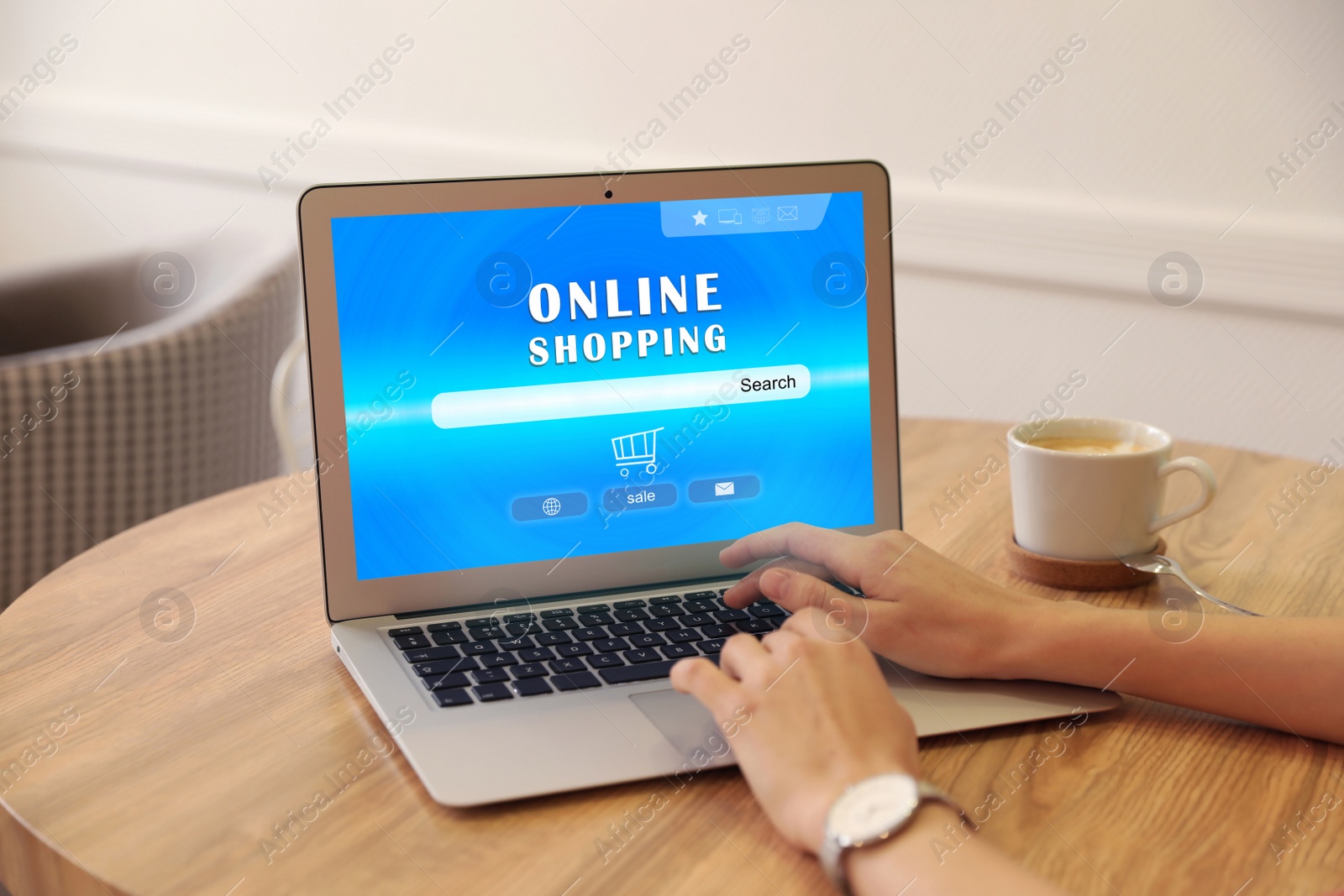 Image of Woman using laptop for online shopping indoors, closeup