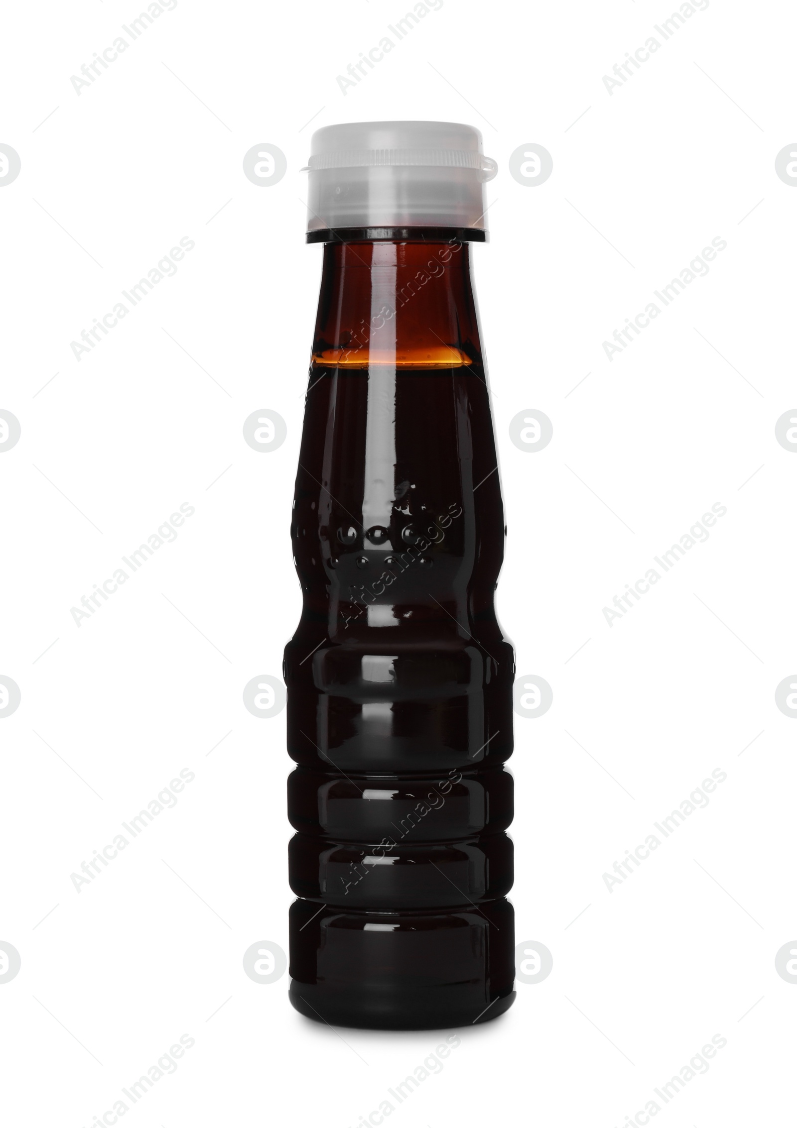 Photo of Bottle of tasty soy sauce isolated on white