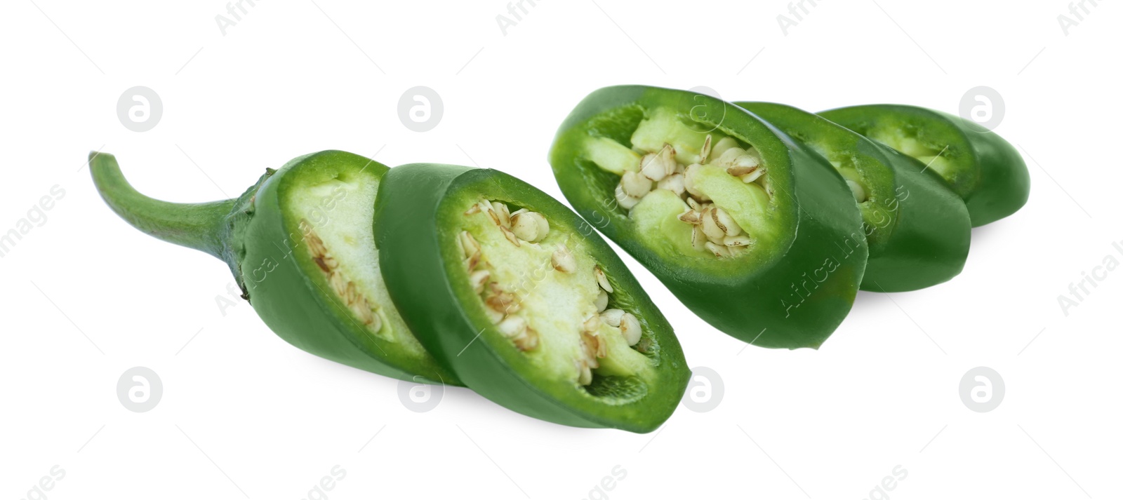 Photo of Cut green hot chili pepper isolated on white