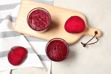 Photo of Flat lay composition with beet smoothies on light background