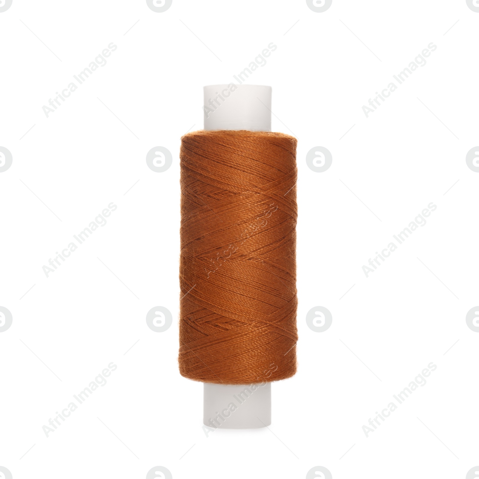 Photo of Spool of dark orange sewing thread isolated on white