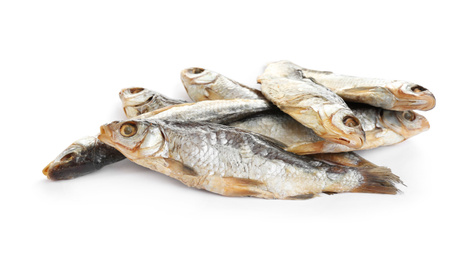 Photo of Tasty dried fish isolated on white. Seafood