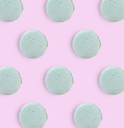 Image of Delicious macarons on lilac background, flat lay 