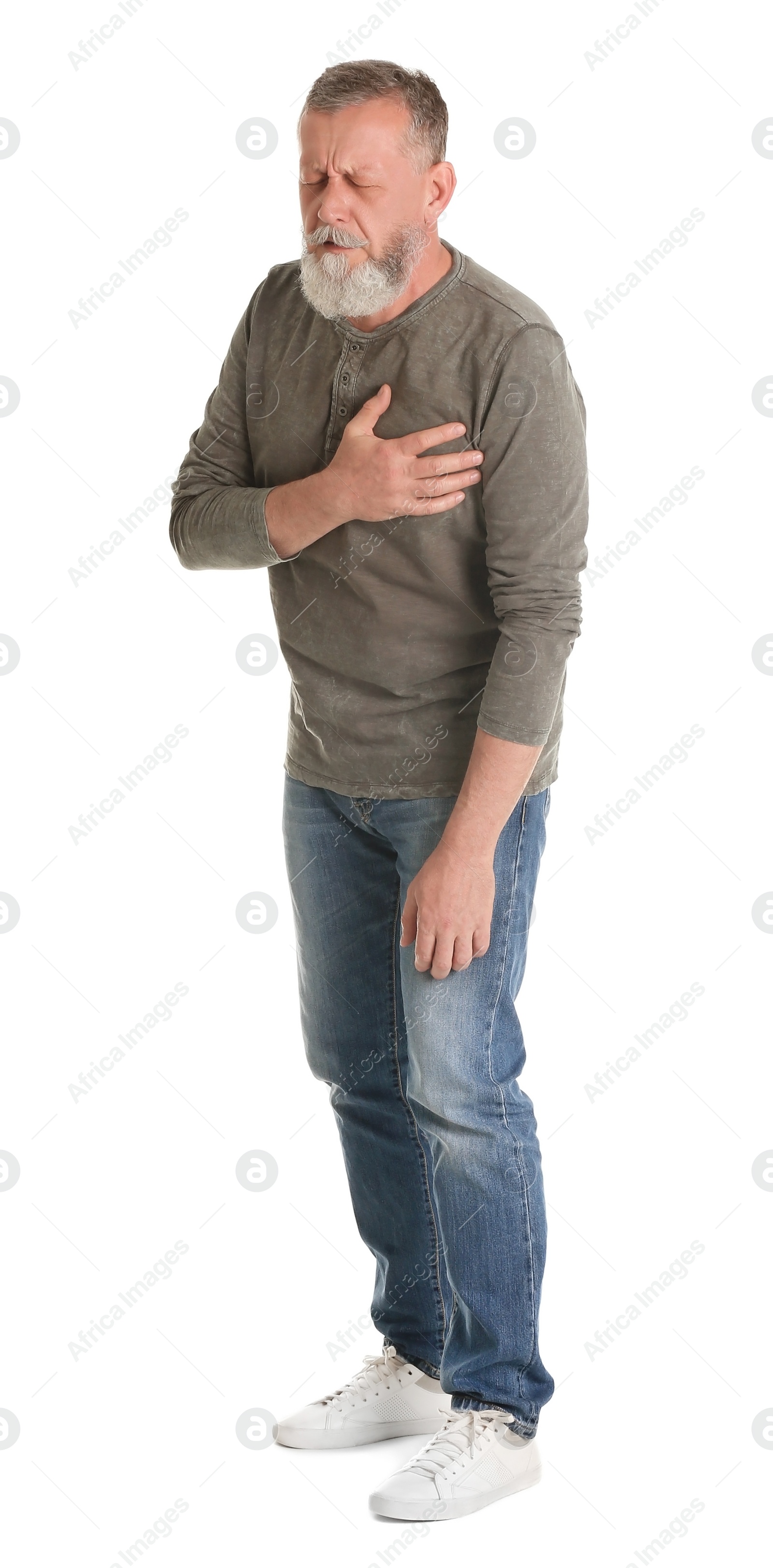 Photo of Mature man having heart attack on white background