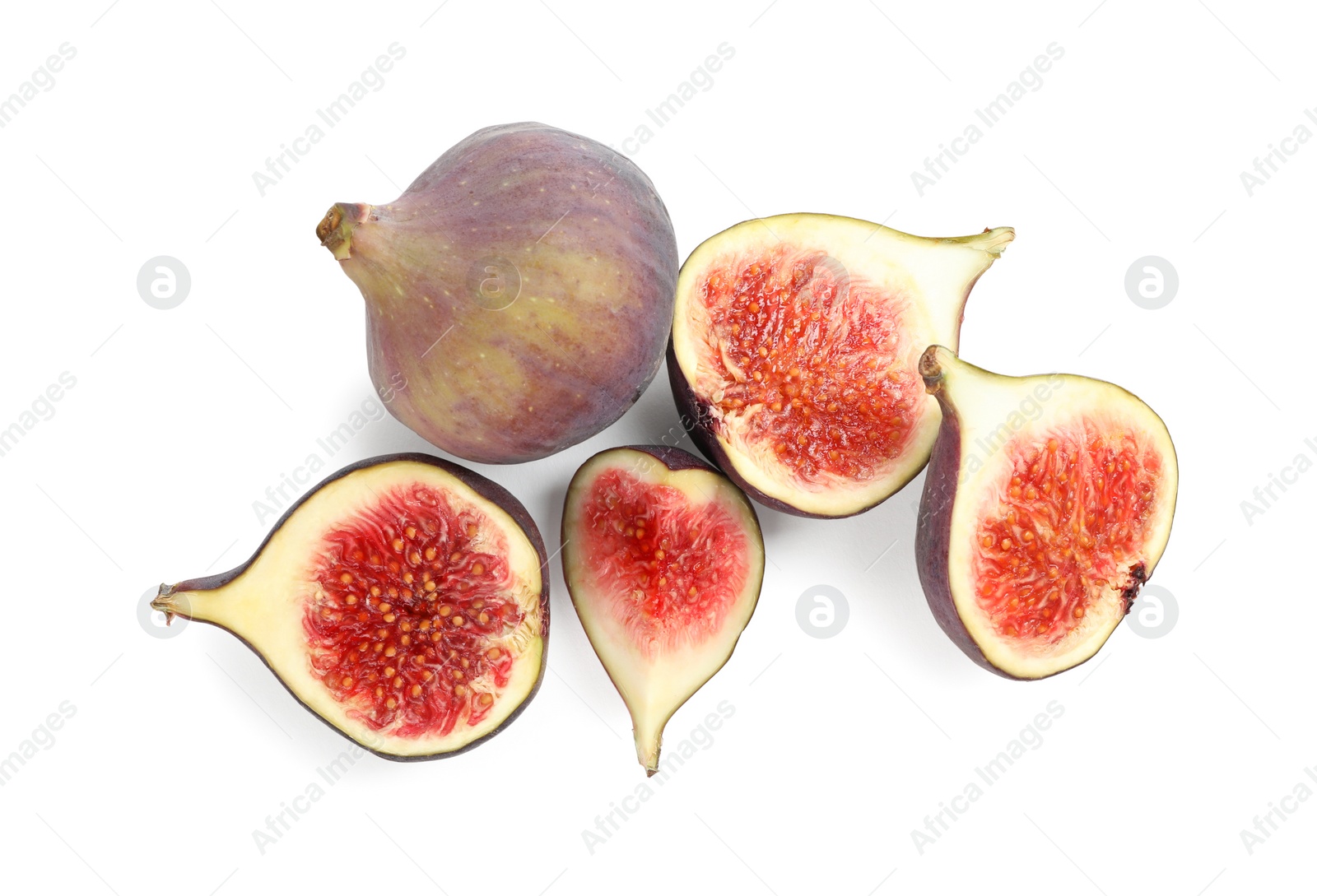 Photo of Whole and cut tasty fresh figs on white background, top view