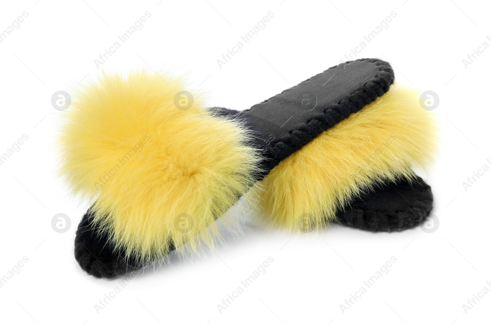 Photo of Pair of fluffy slippers isolated on white