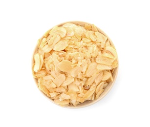 Dried garlic flakes in bowl on white background, top view