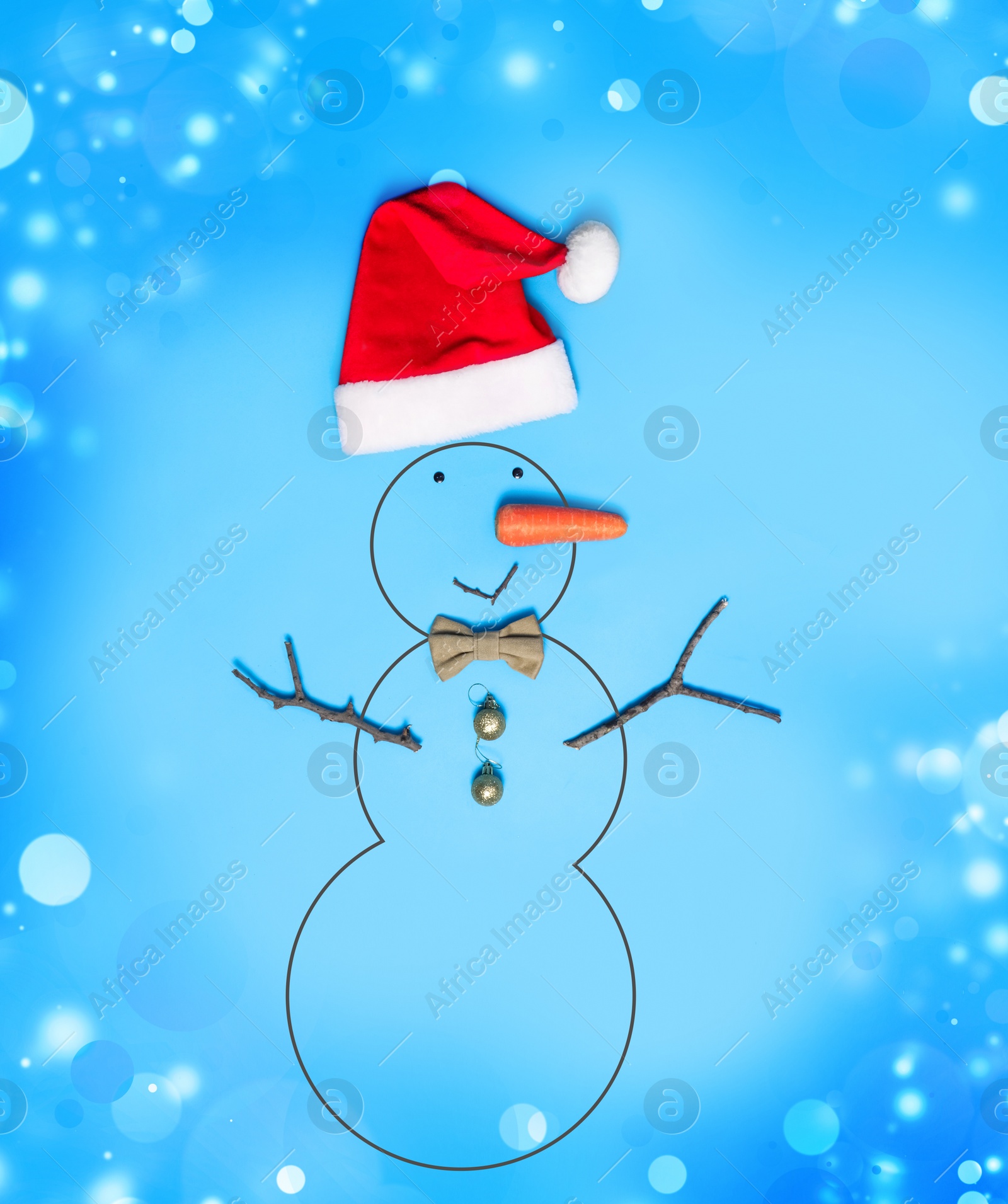 Image of Snowman with Santa hat and bow tie on light blue background, flat lay. Bokeh effect