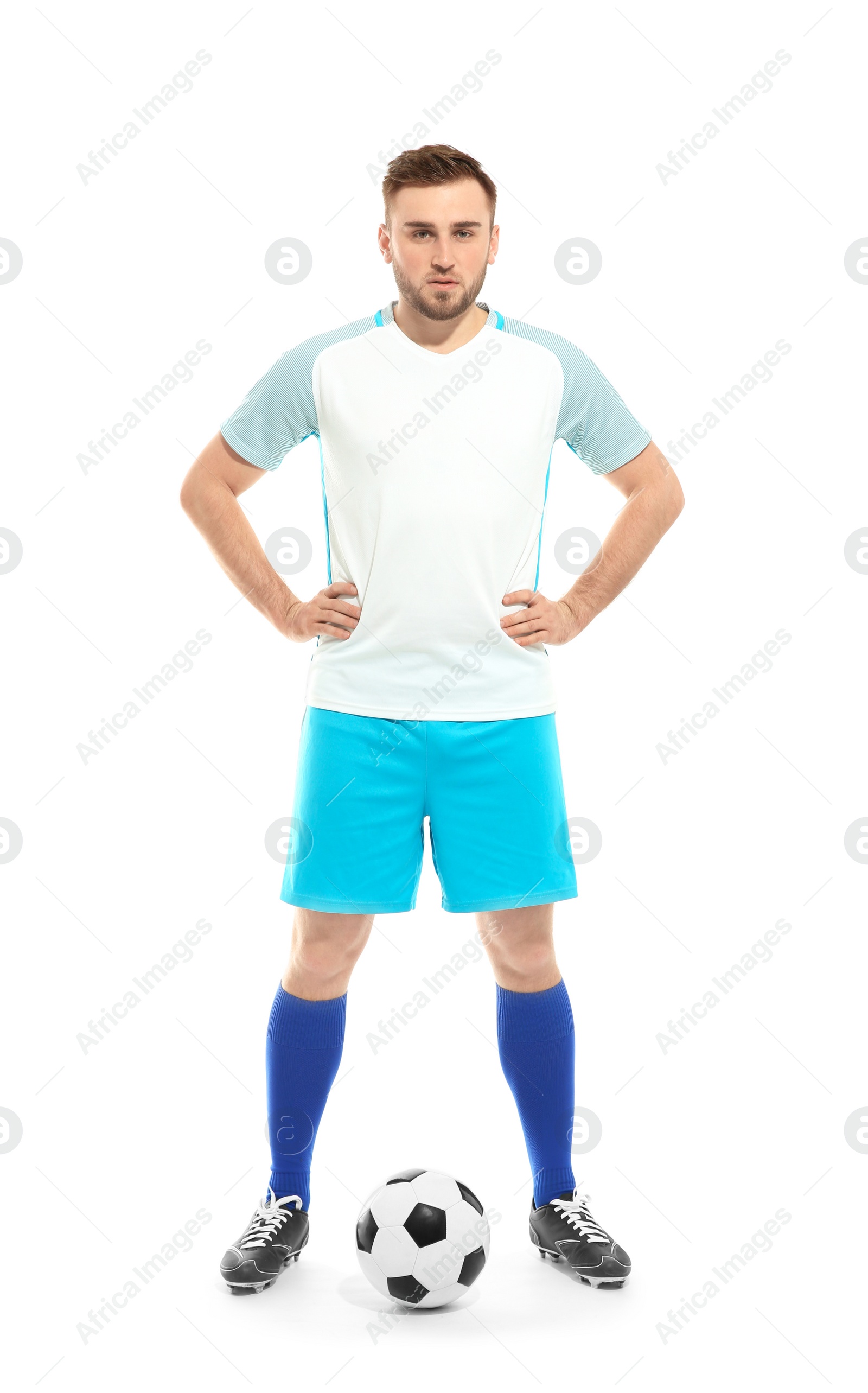 Photo of Young football player in uniform on white background