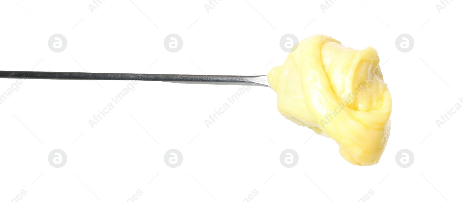 Photo of Tasty fondue. Fork with piece of ham and melted cheese isolated on white