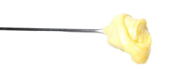 Photo of Tasty fondue. Fork with piece of ham and melted cheese isolated on white