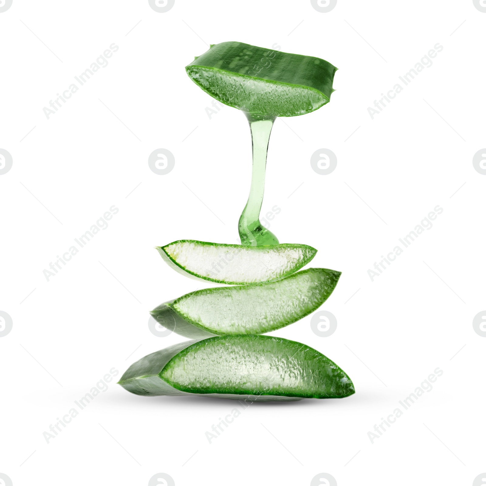 Image of Aloe vera gel flowing down from green leaf section on white background