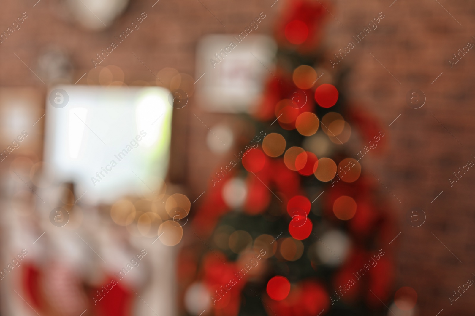 Photo of Blurred view of room with beautiful Christmas tree