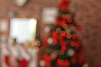 Photo of Blurred view of room with beautiful Christmas tree