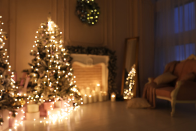 Blurred view of festive room interior with Christmas trees