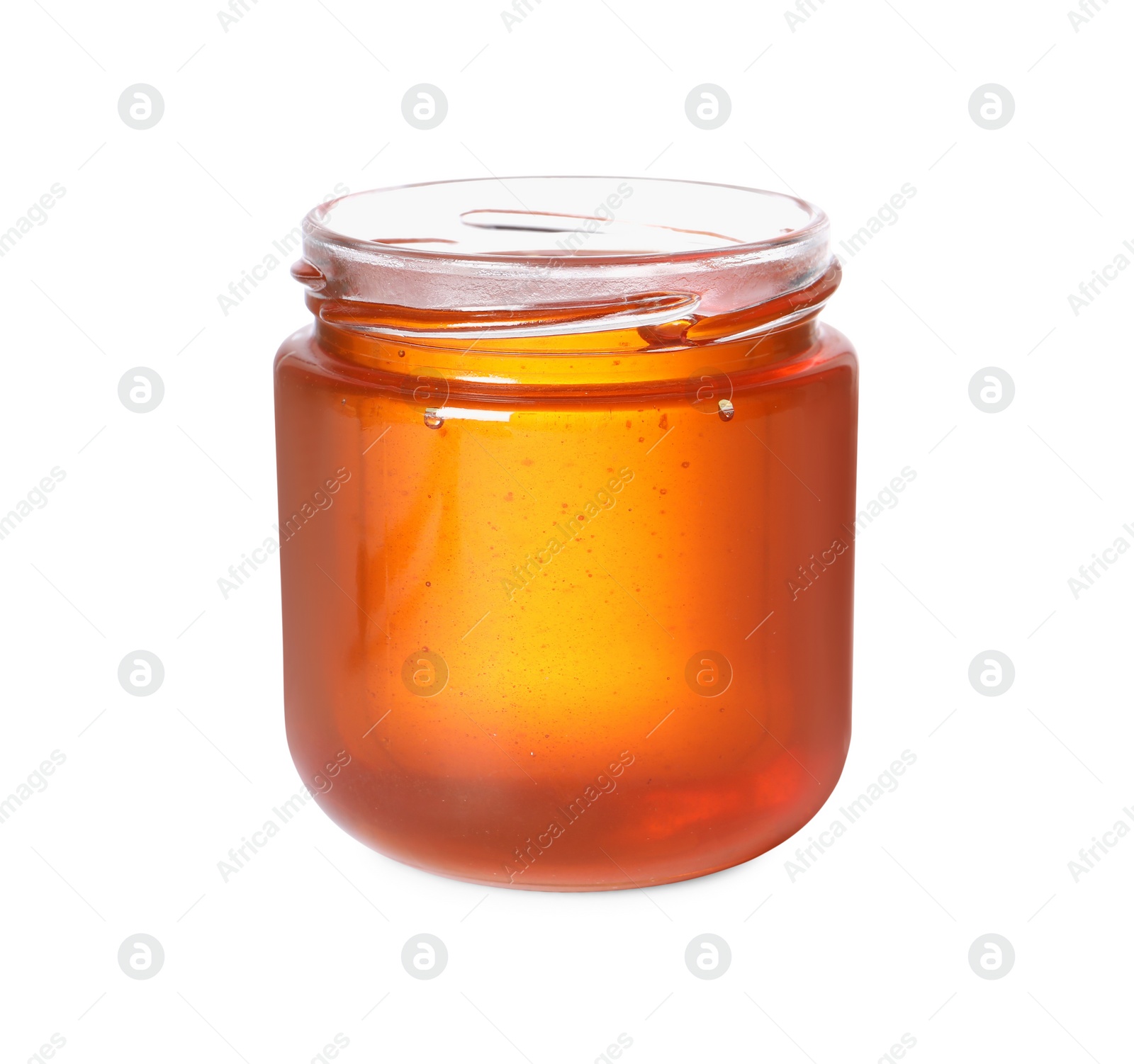 Photo of Tasty natural honey in glass jar isolated on white