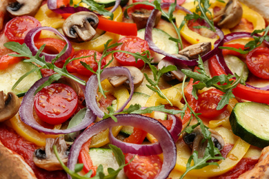 Photo of Delicious hot vegetable pizza with mushrooms as background, closeup