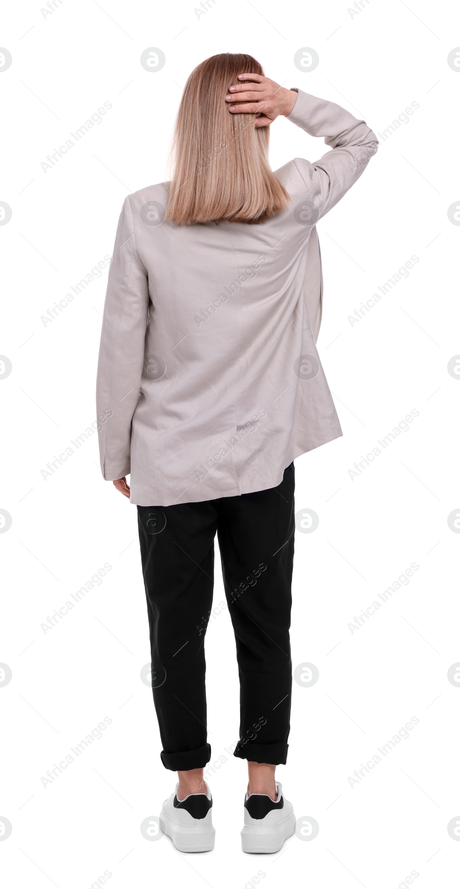 Photo of Businesswoman posing on white background, back view