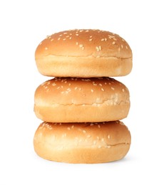 Photo of Three fresh burger buns isolated on white