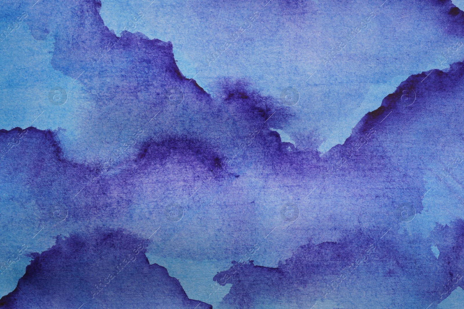 Photo of Abstract blue watercolor painting as background, top view