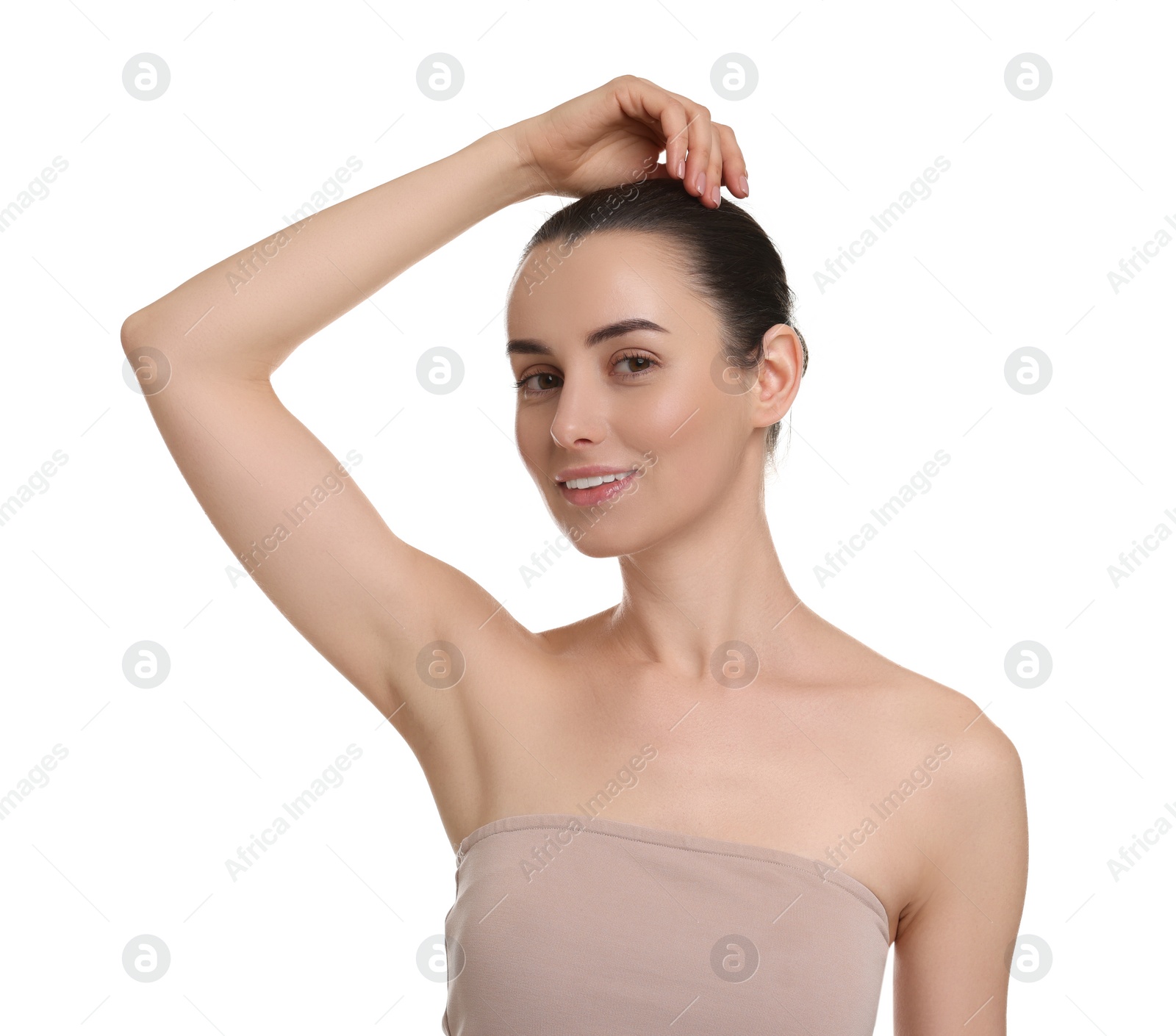 Photo of Beautiful woman showing armpit with smooth clean skin on white background