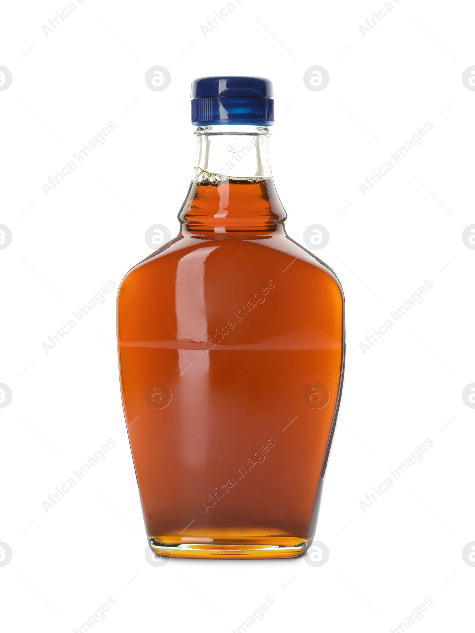 Photo of Bottle of tasty maple syrup isolated on white