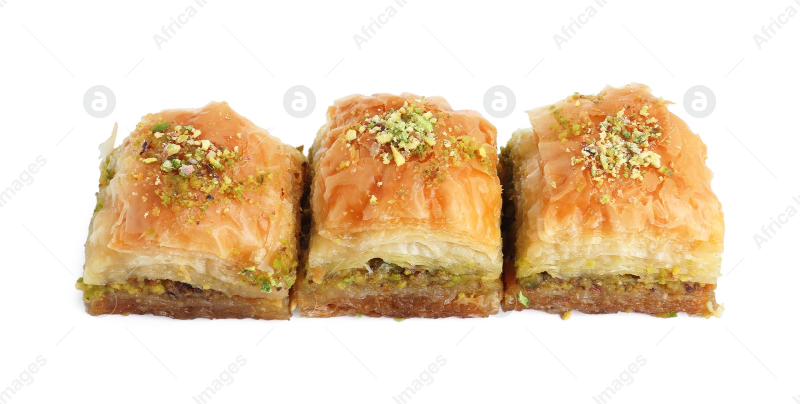 Photo of Delicious fresh baklava with chopped nuts isolated on white. Eastern sweets