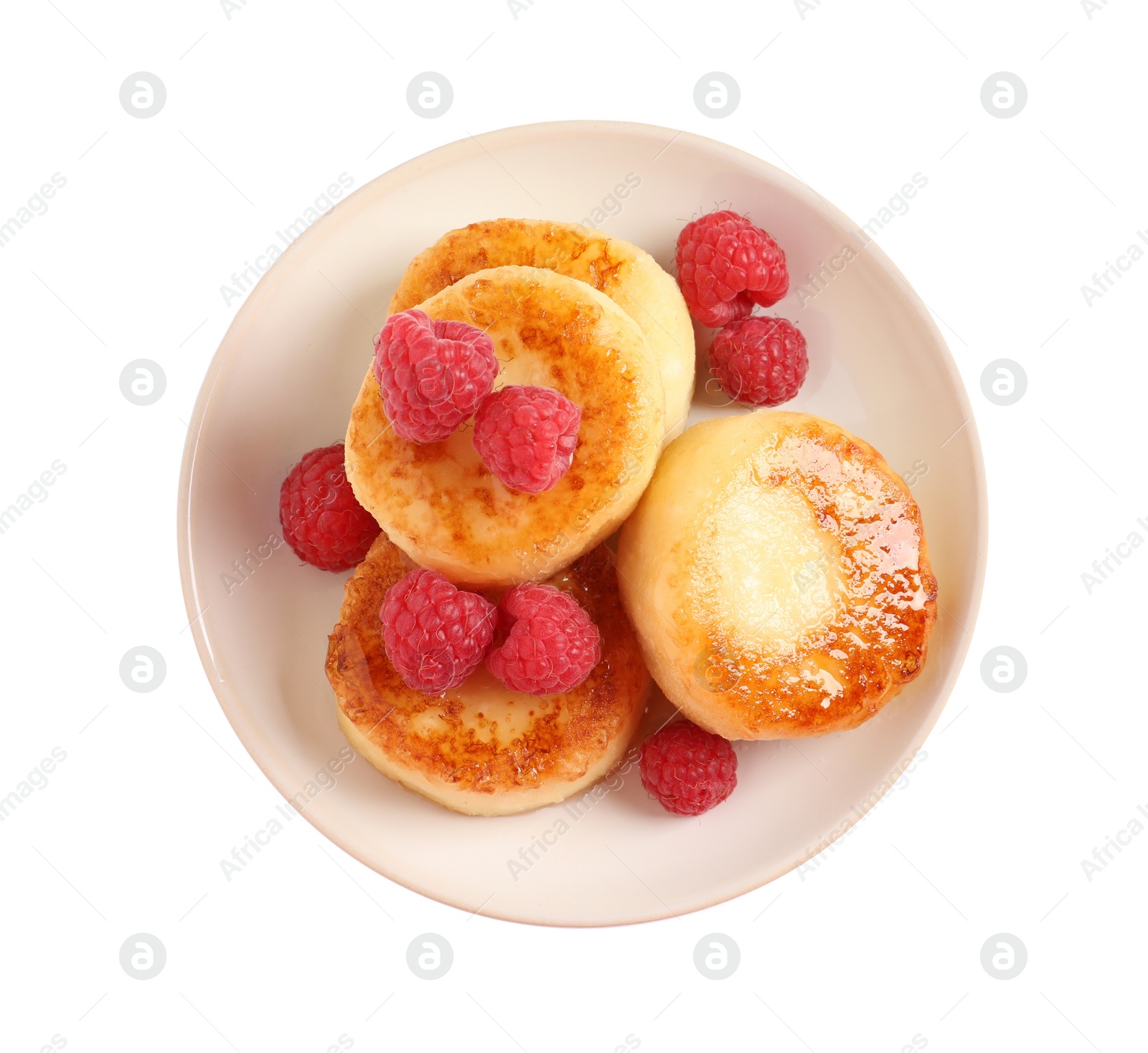 Photo of Delicious cottage cheese pancakes with raspberries on white background, top view