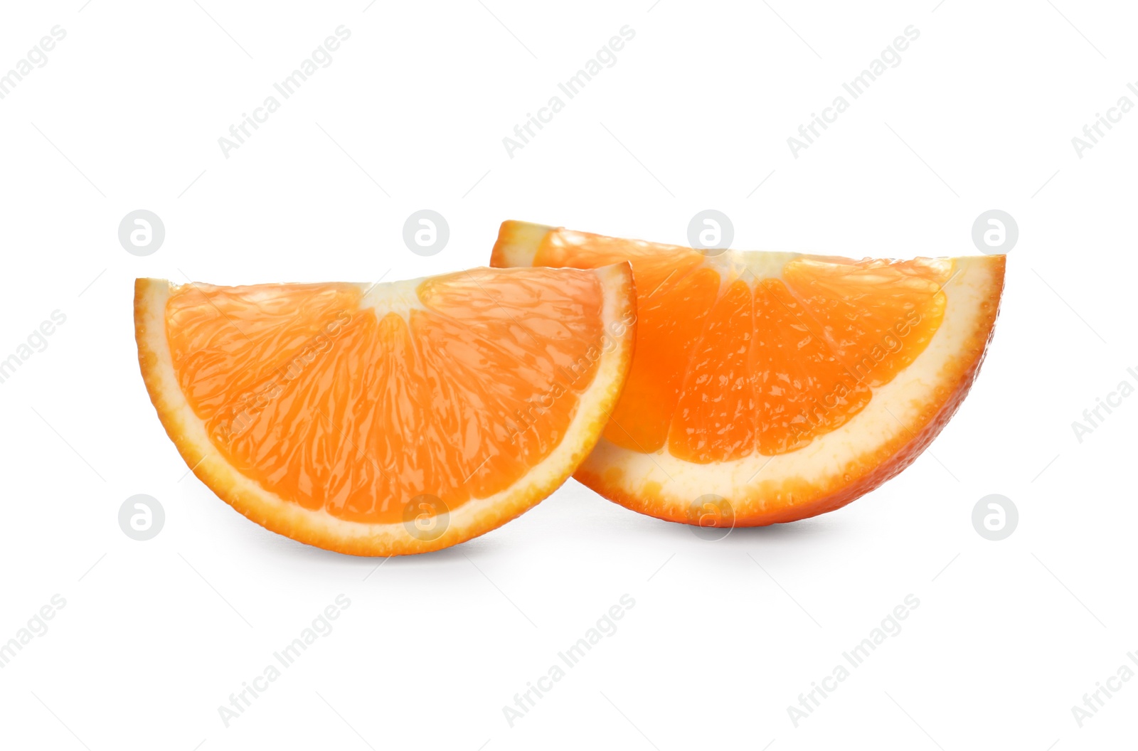 Photo of Slices of ripe orange isolated on white