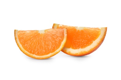 Photo of Slices of ripe orange isolated on white