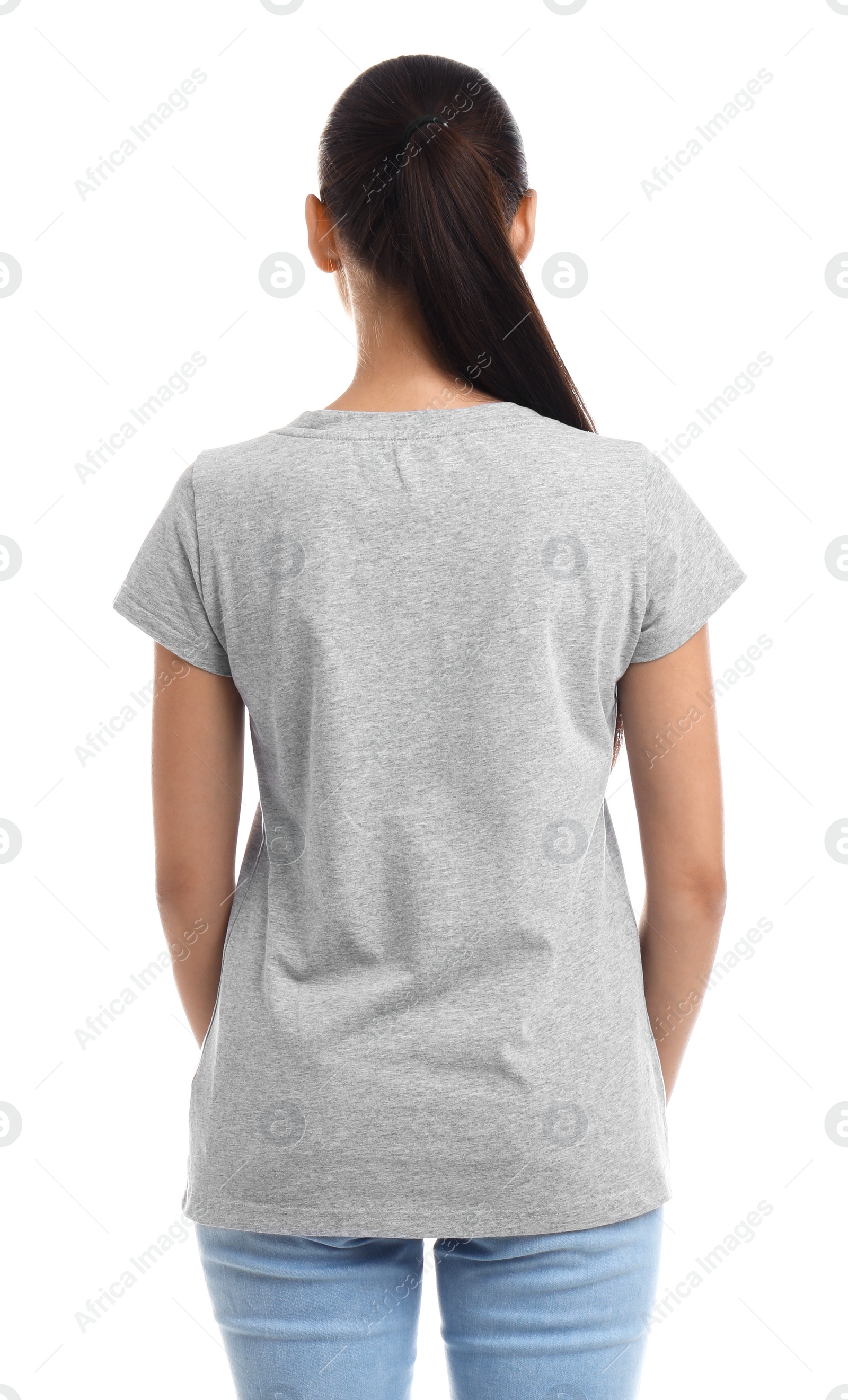 Photo of Young woman in t-shirt on white background. Mockup for design