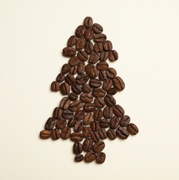 Flat lay composition with Christmas tree made of coffee beans on light background