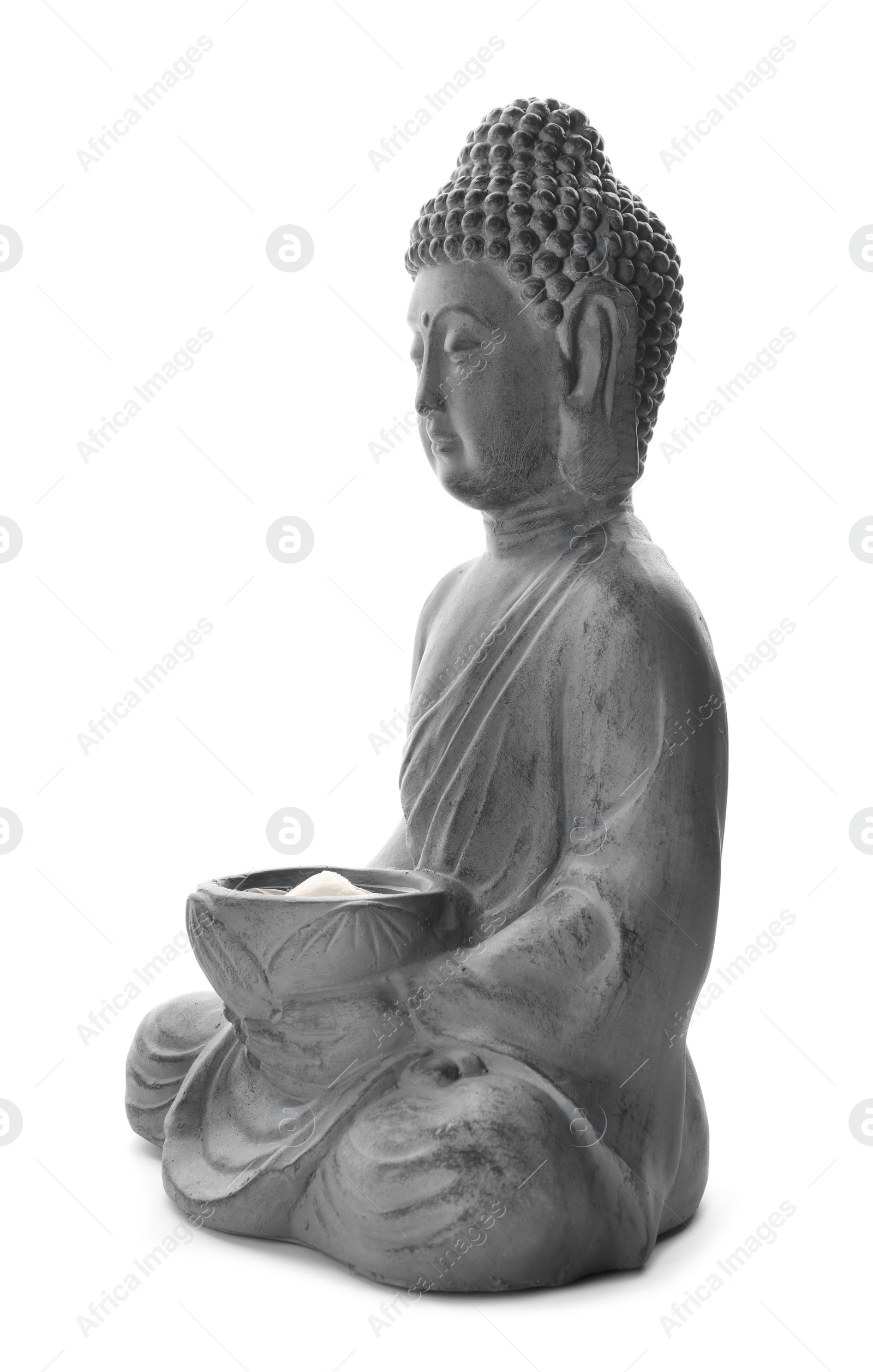 Photo of Beautiful stone Buddha sculpture with flower petals isolated on white