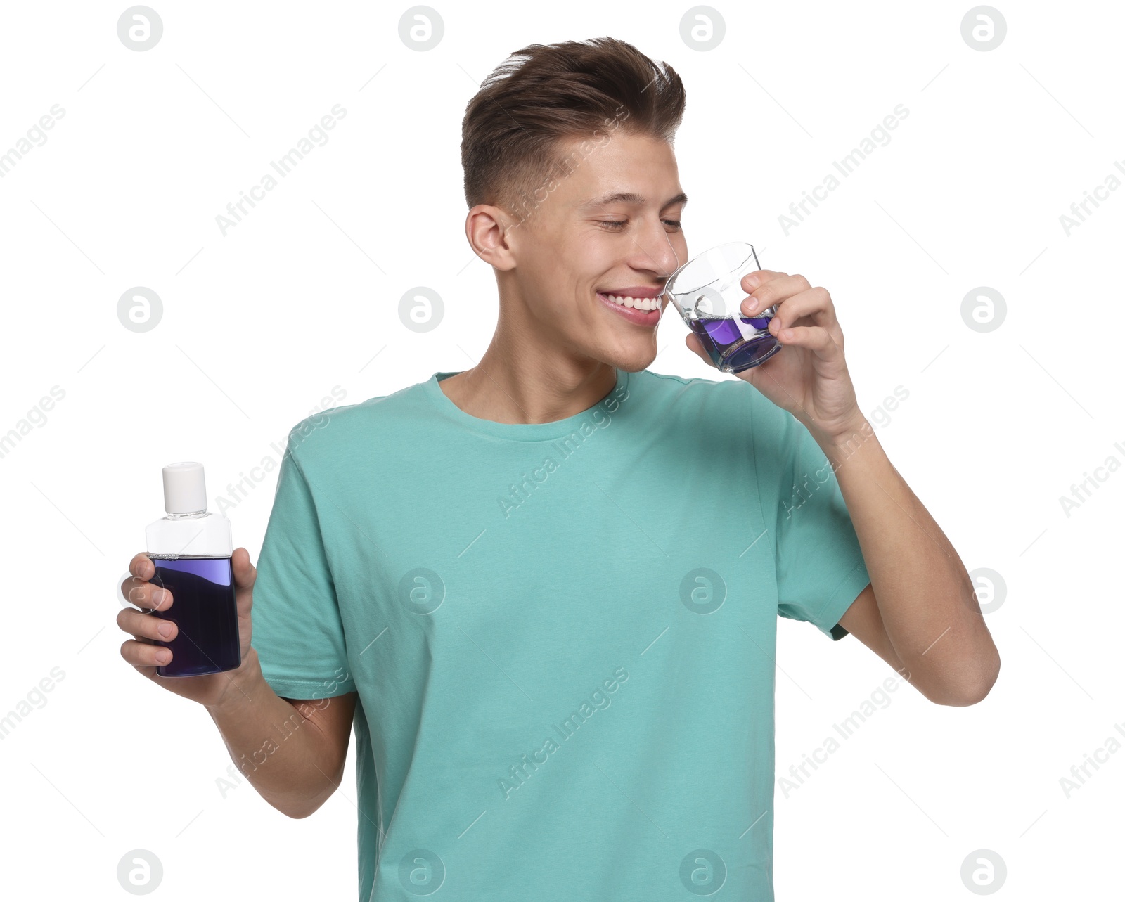 Photo of Young man with mouthwash on white background