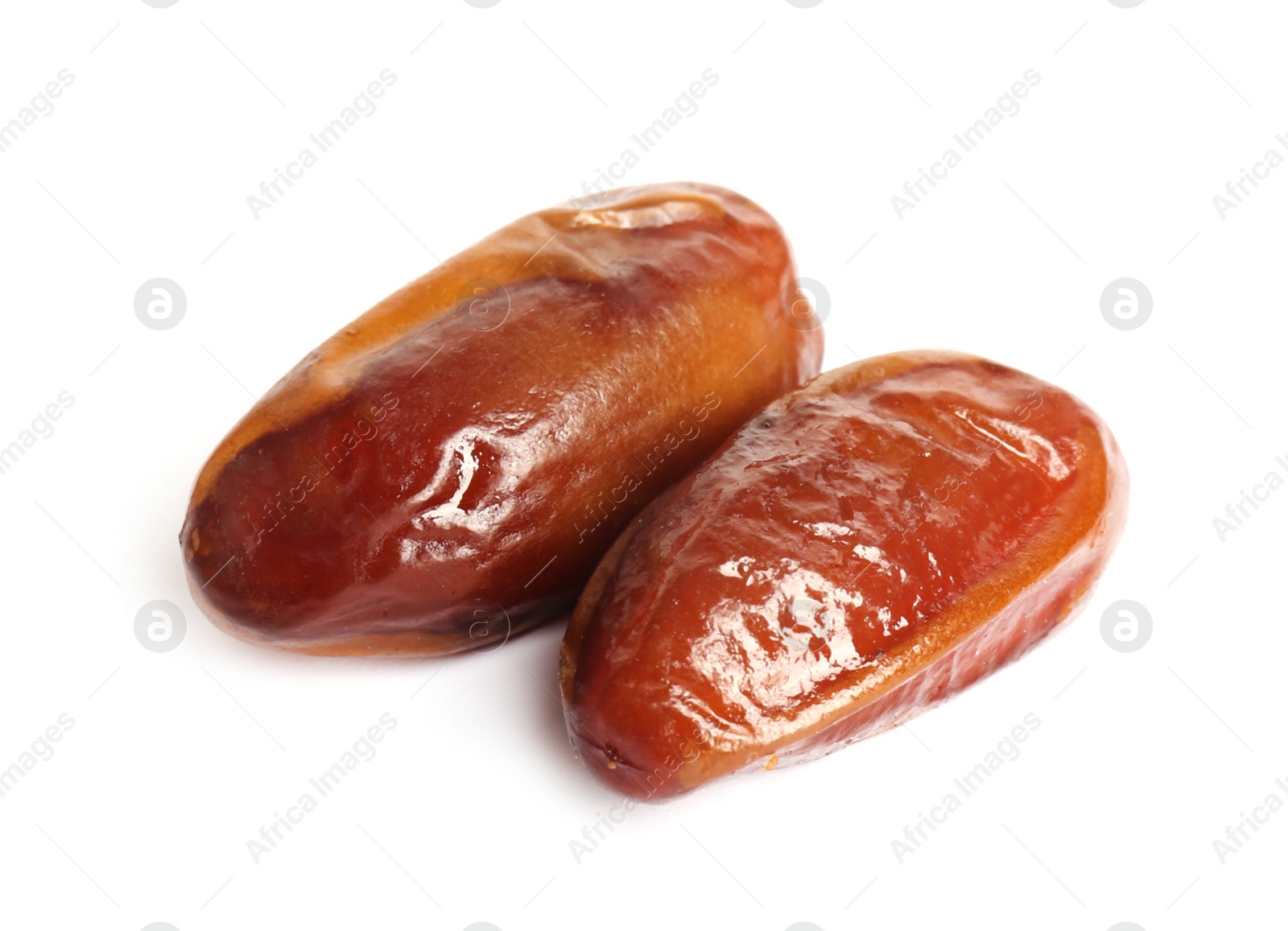 Photo of Two tasty sweet dried dates on white background