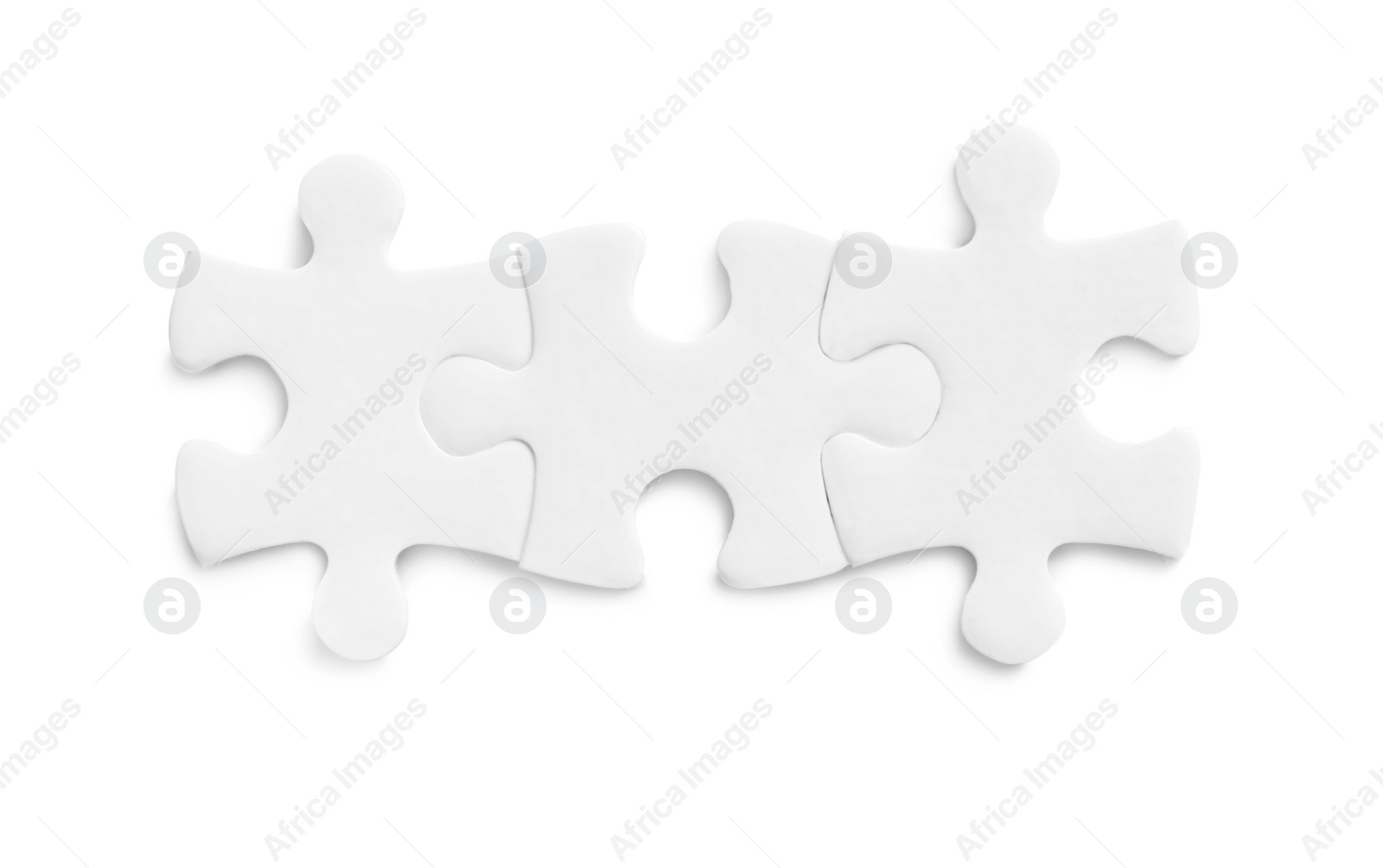 Photo of Blank puzzle pieces isolated on white, top view