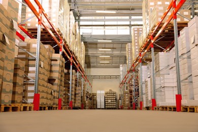 Image of Worker in warehouse, low angle view. Wholesale business