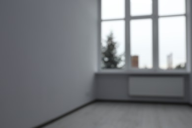 Blurred view of window in empty renovated room