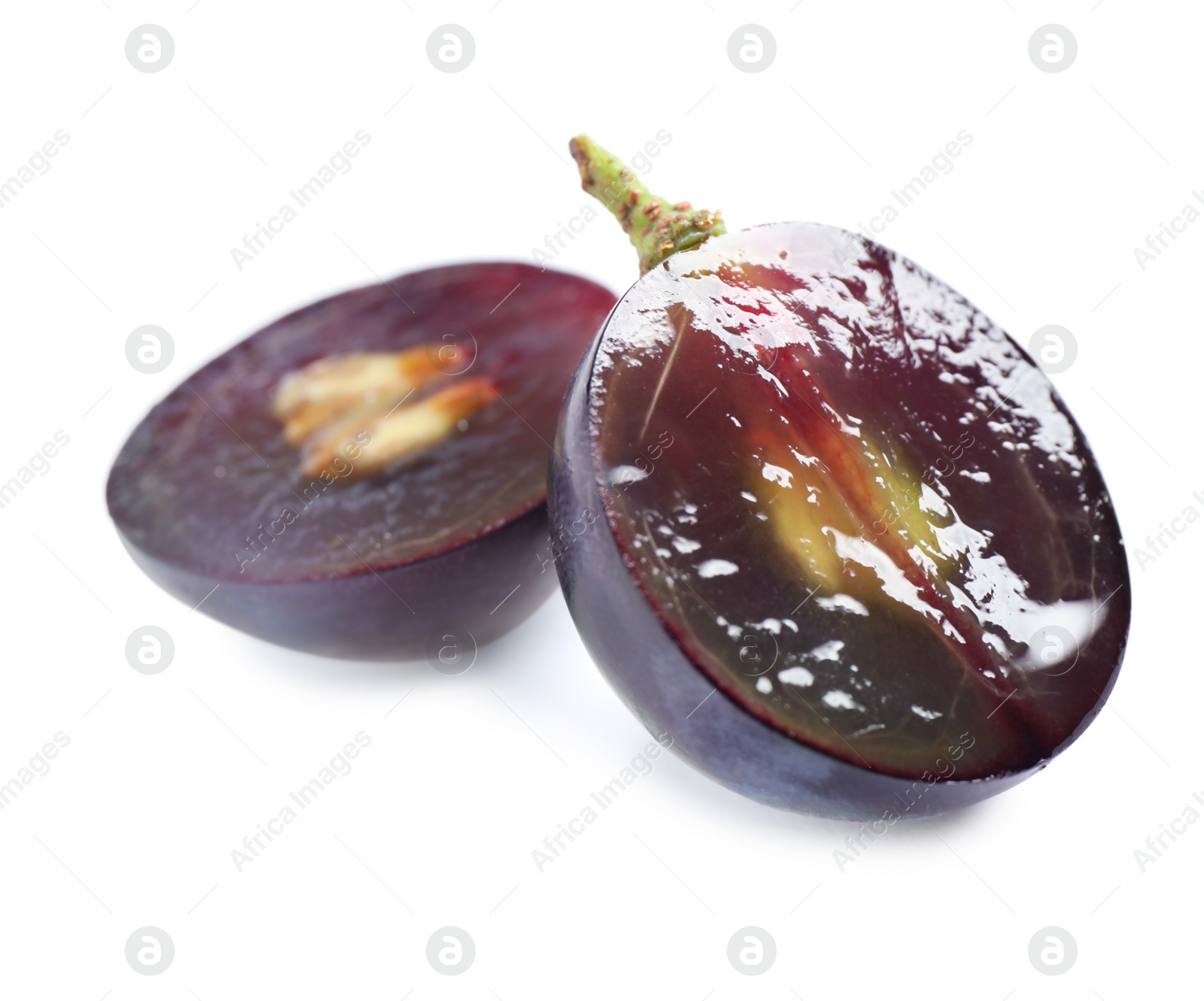 Photo of Fresh ripe cut juicy grapes on white background