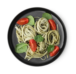 Photo of Tasty pasta with spinach, sauce and tomatoes isolated on white, top view