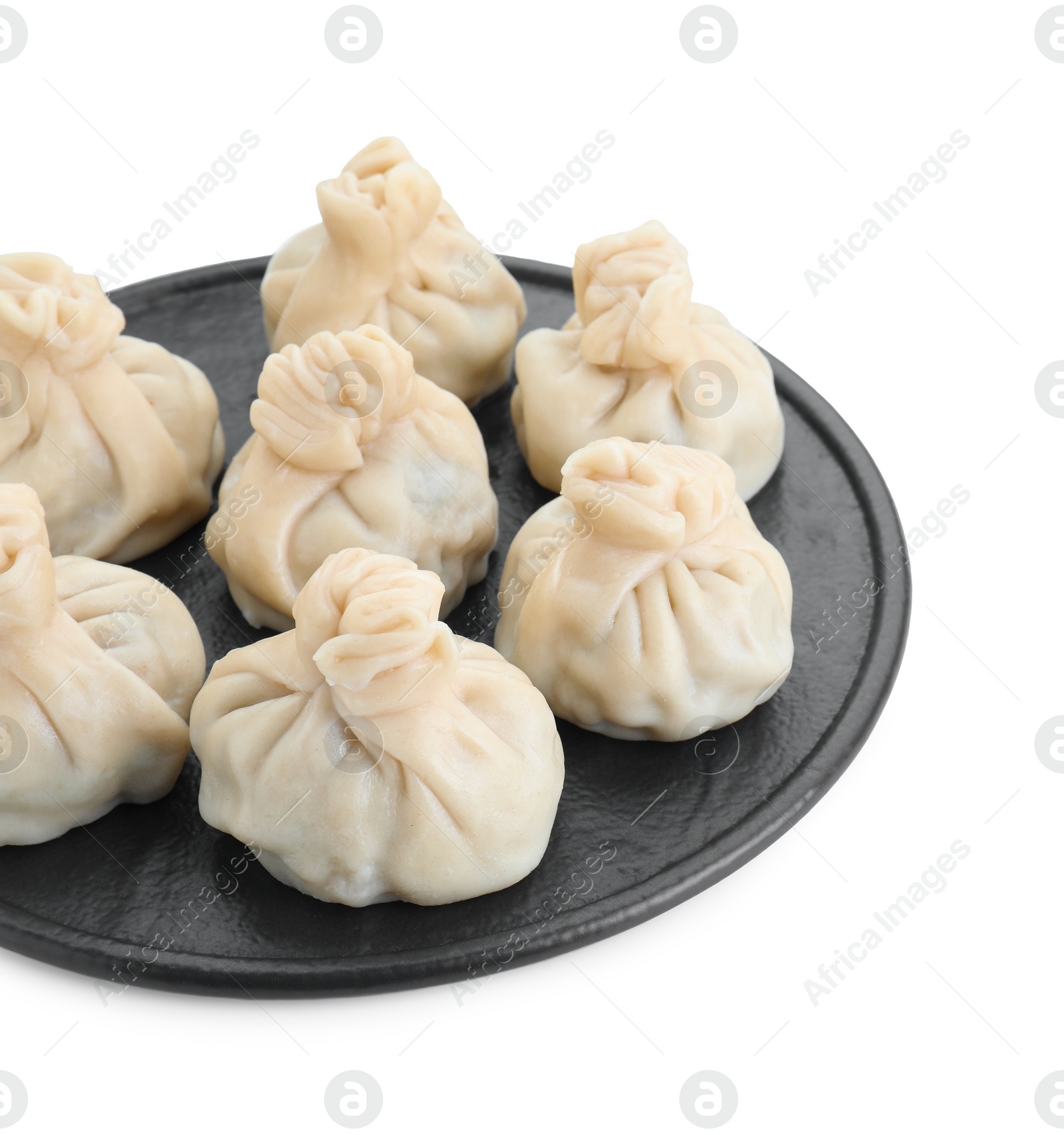 Photo of Serving board with tasty fresh khinkali (dumplings) isolated on white. Georgian cuisine