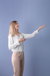 Female business trainer on color background