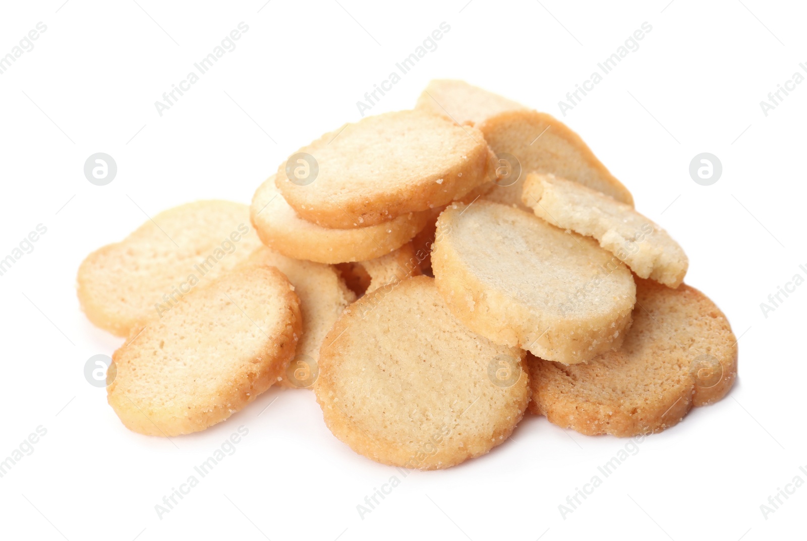 Photo of Pile of delicious crispy rusks on white background