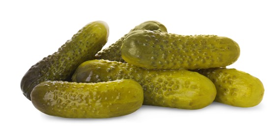 Photo of Pile of tasty pickled cucumbers on white background