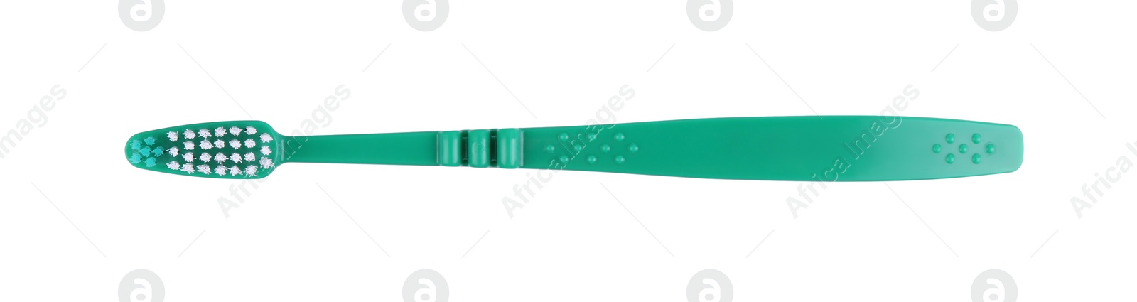 Photo of Green plastic toothbrush isolated on white, top view