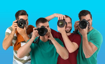 Image of Group of professional photographers with cameras on turquoise background